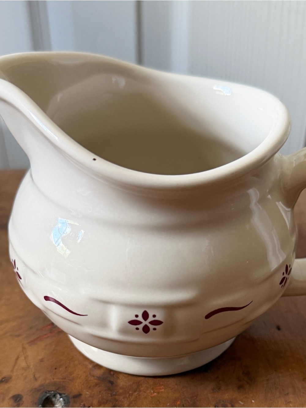 Longaberger Cream Ceramic Pitcher with Red Floral Motif